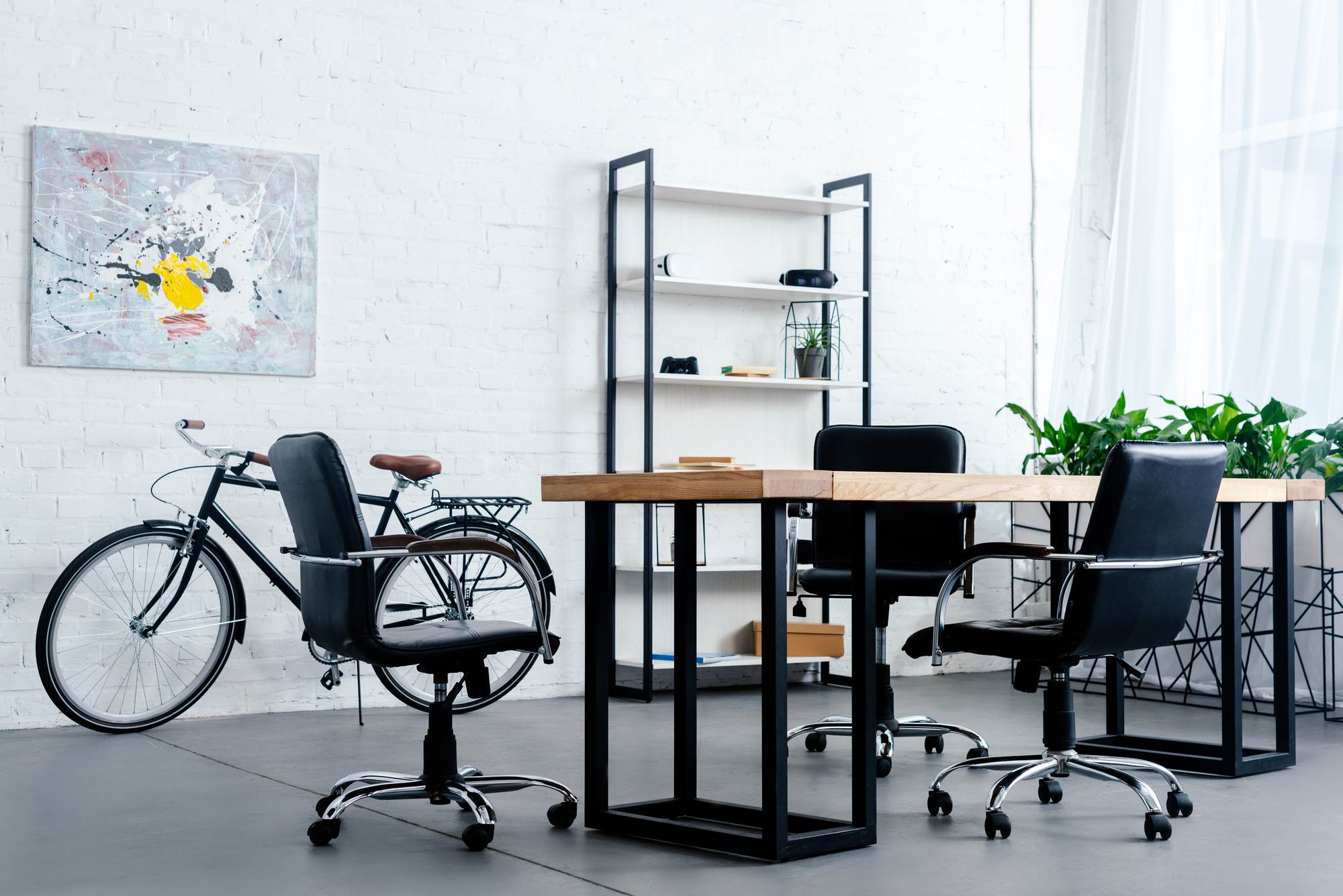 modern-office-interior-with-bicycle-table-and-chai-JVC4Y2W.jpg